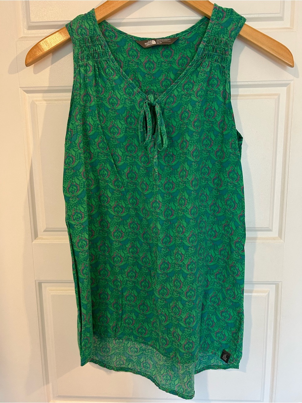 The North Face women’s green sleeveless top